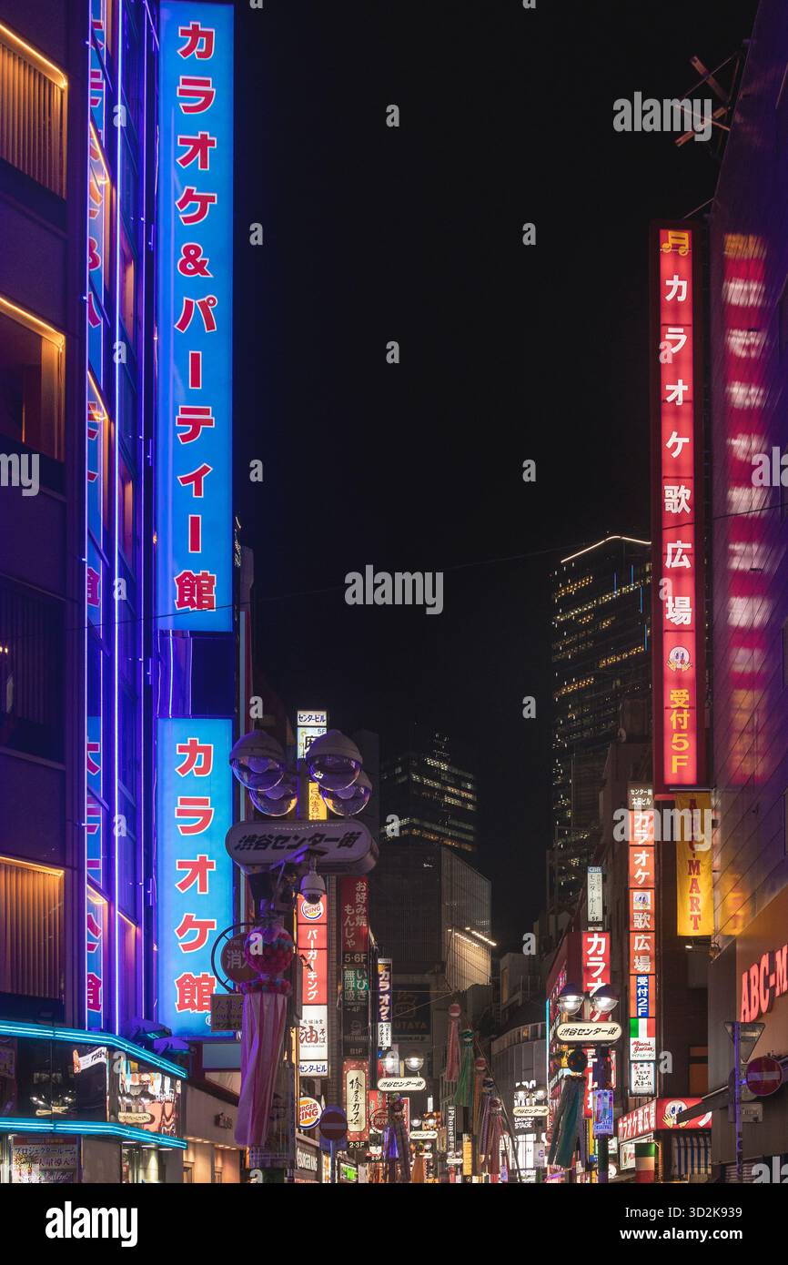 Stops in Shibuya, Tokyo at night, August 2025 - Stock Image