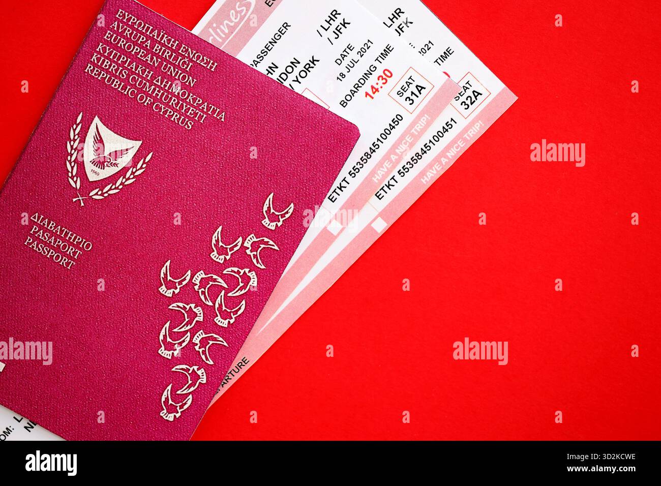 Kyprus passport and commercial airlines boarding pass tickets close up. Travel flights and avia tourism in Europe concept Stock Photo