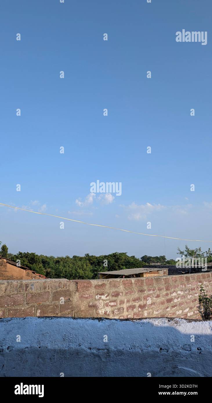 bright, calm, and serene, evoking a warm, clear day in a simple, outdoor setting. - Smartphone Captured Stock Image