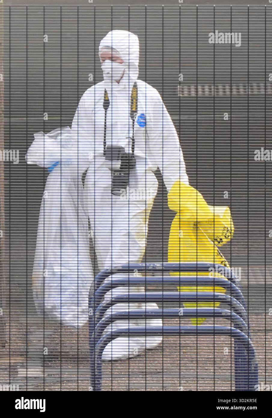 Forensic investigators at Huntingdon train station in Cambridgeshire ...