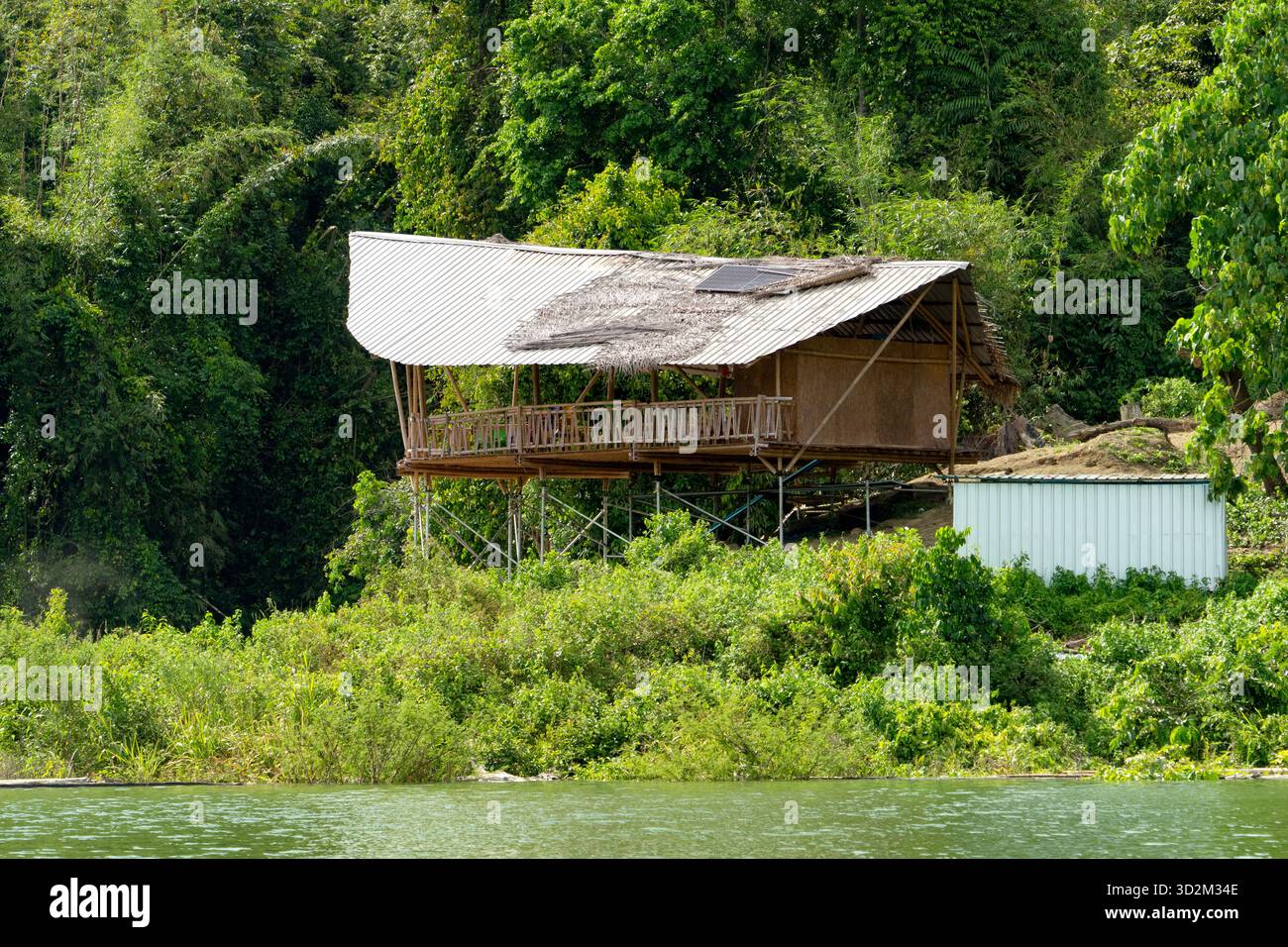 Tropical bamboo bungalow nestled hi-res stock photography and images ...