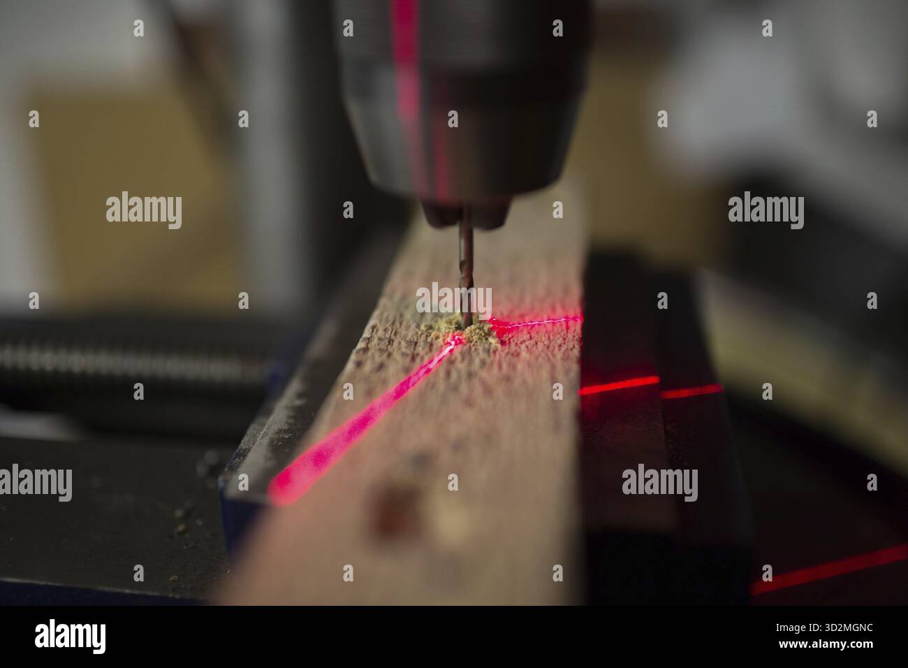 Drilling machine with laser sight in the workshop Stock Photo