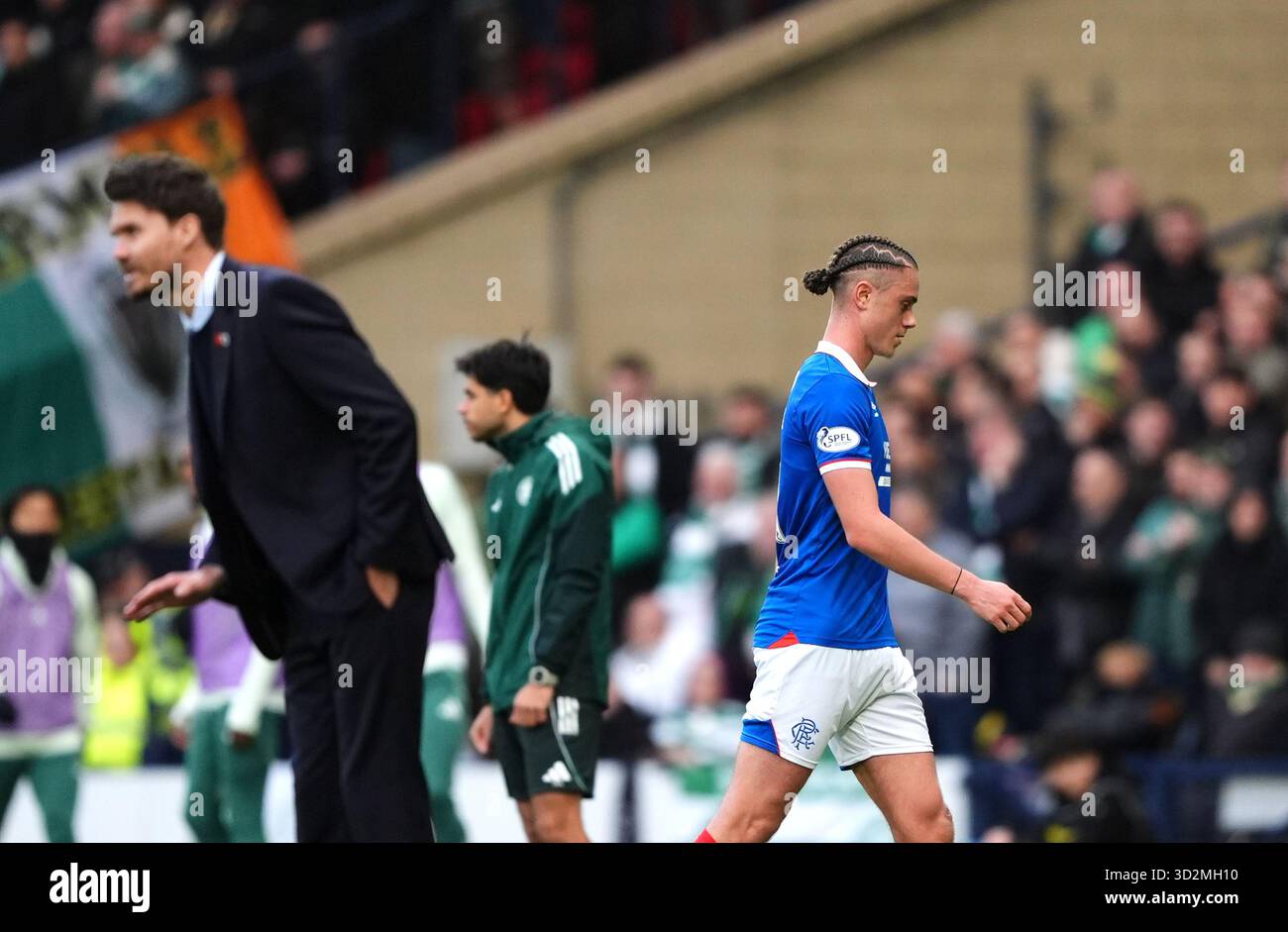 Rangers' Thelo Aasgaard leaves the pitch after being shown a red card ...