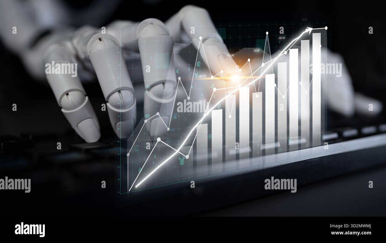 A robotic hand engages with visual financial data on a keyboard, showcasing the intersection of technology and finance through automated analysis and Stock Photo