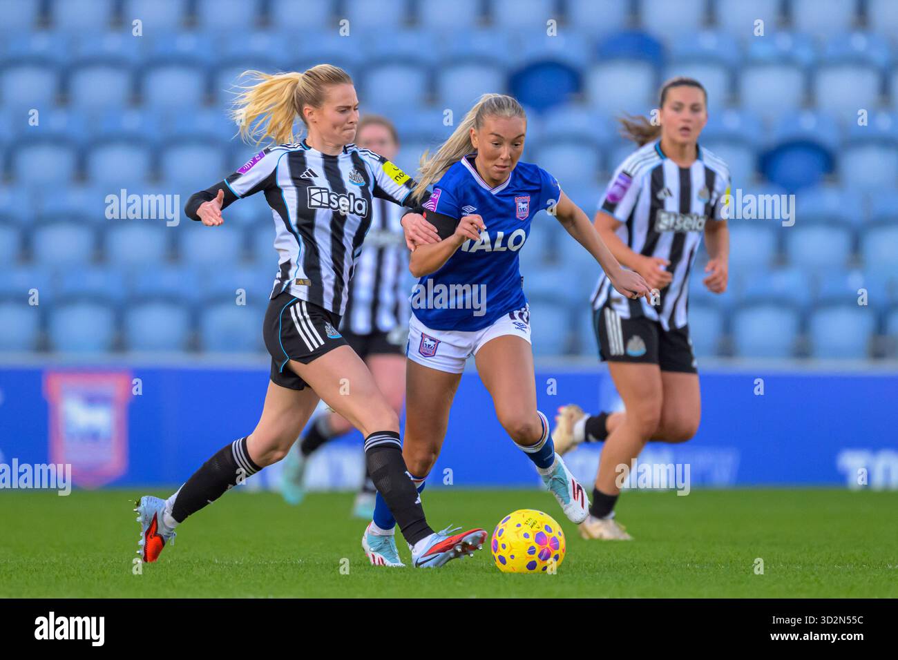 Ruby Doe Molly Pike (10 Newcastle United) fouls Ruby Doe (18 Ipswich Town ...