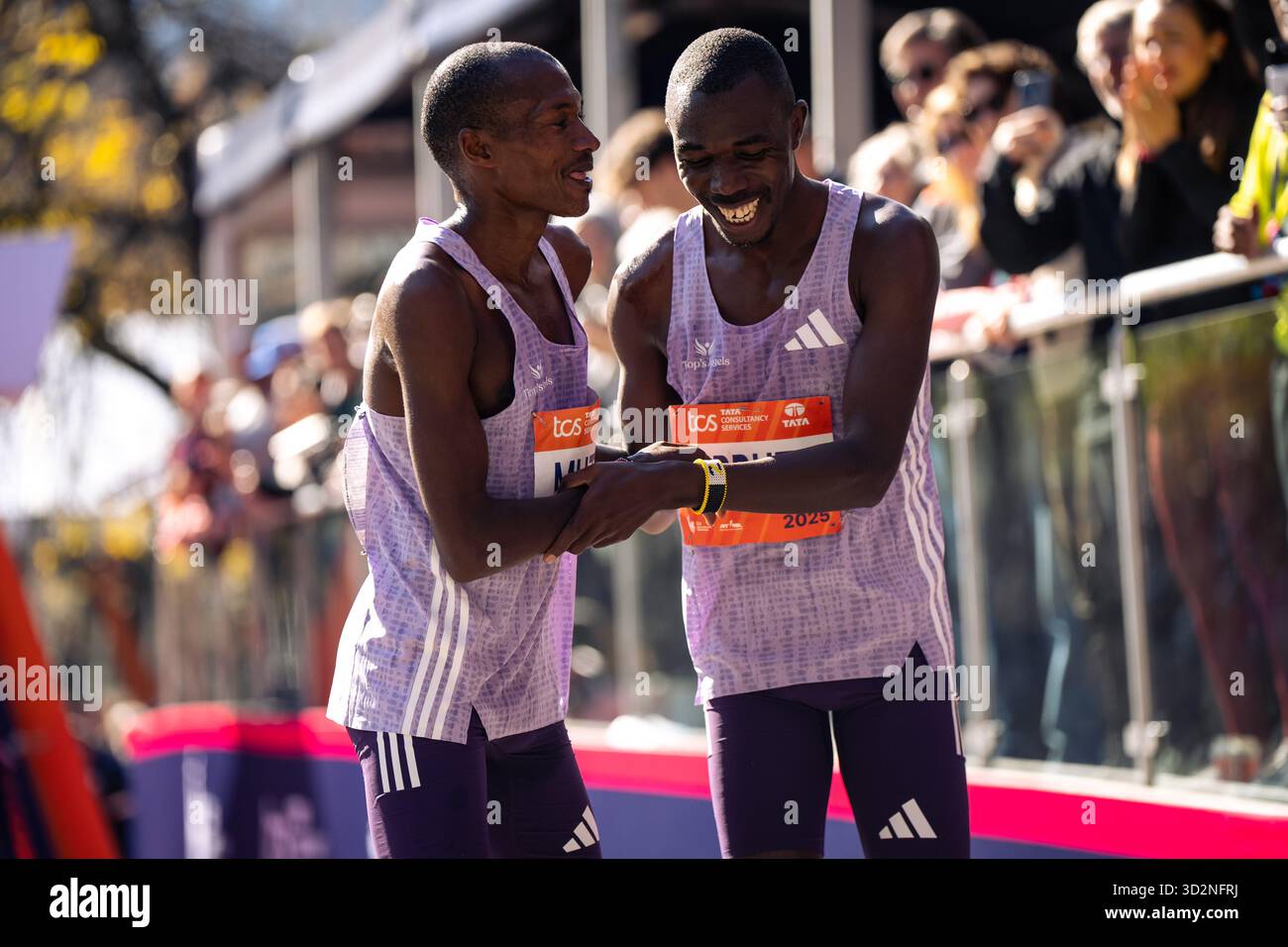 Alexander Mutiso and Benson Kipruto laugh with each other after a close ...