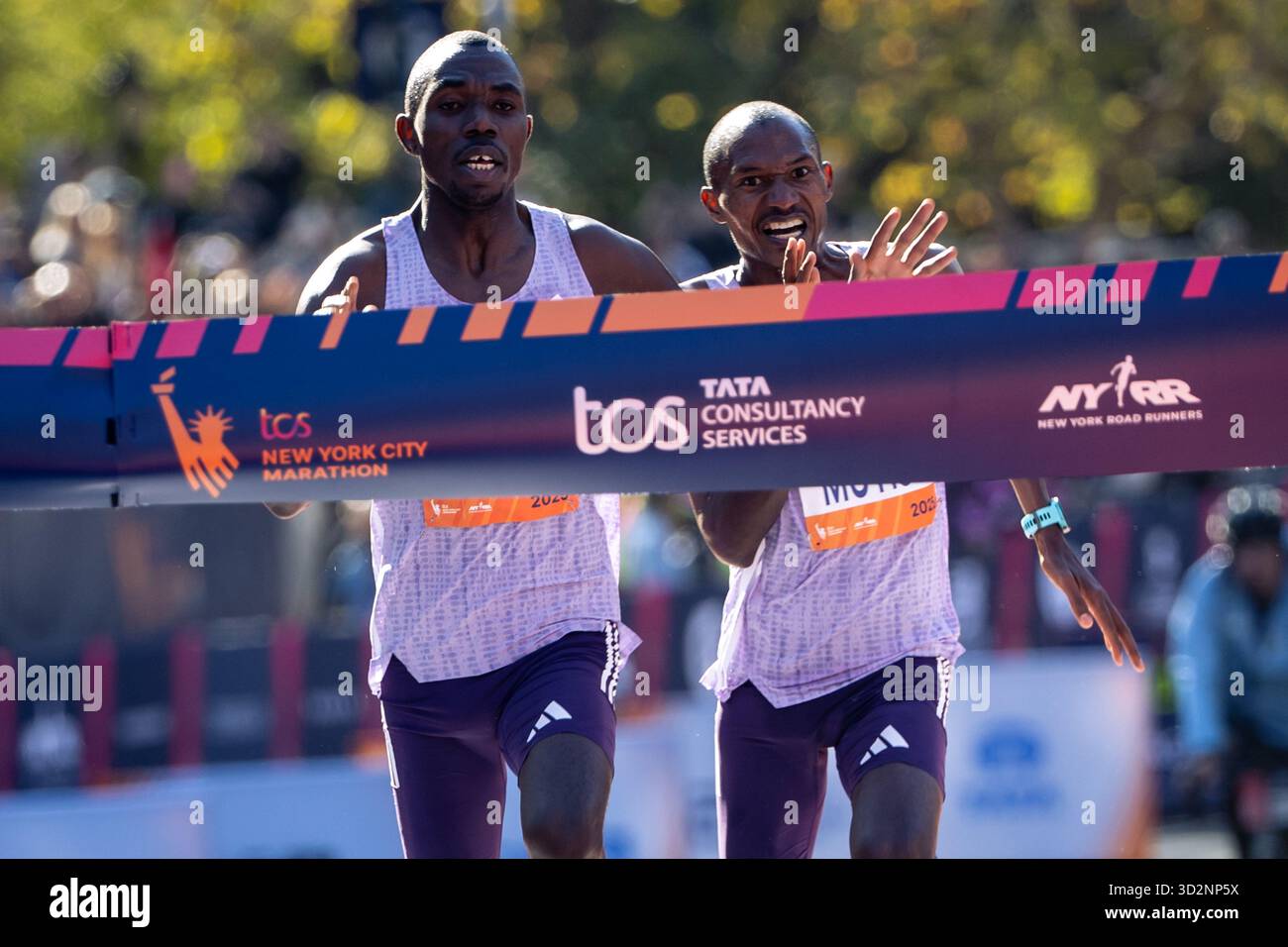 Benson Kipruto and Alexander Mutiso race toward the finish line in the ...
