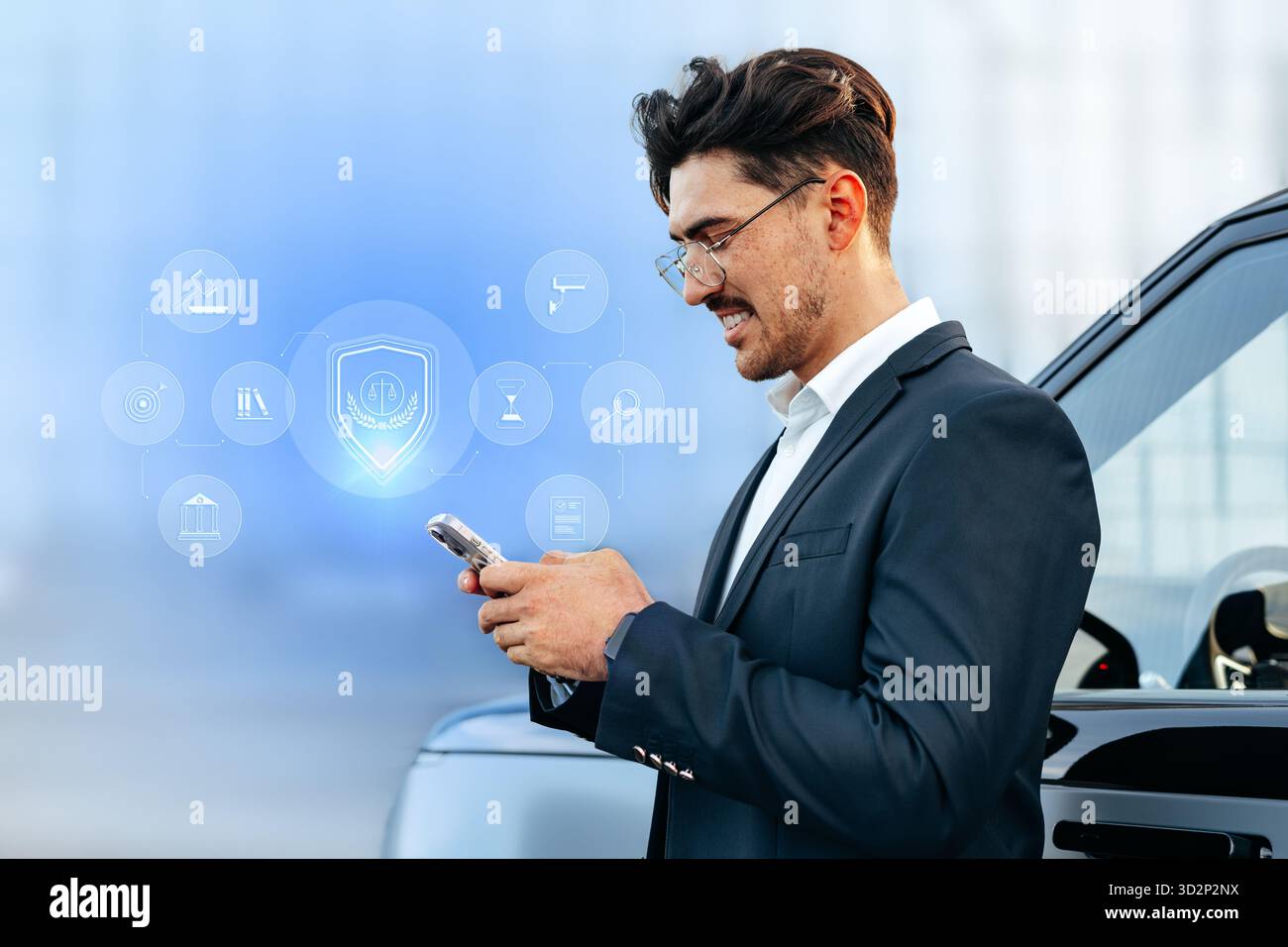 Person using smartphone while standing next to a car in a modern setting Stock Photo