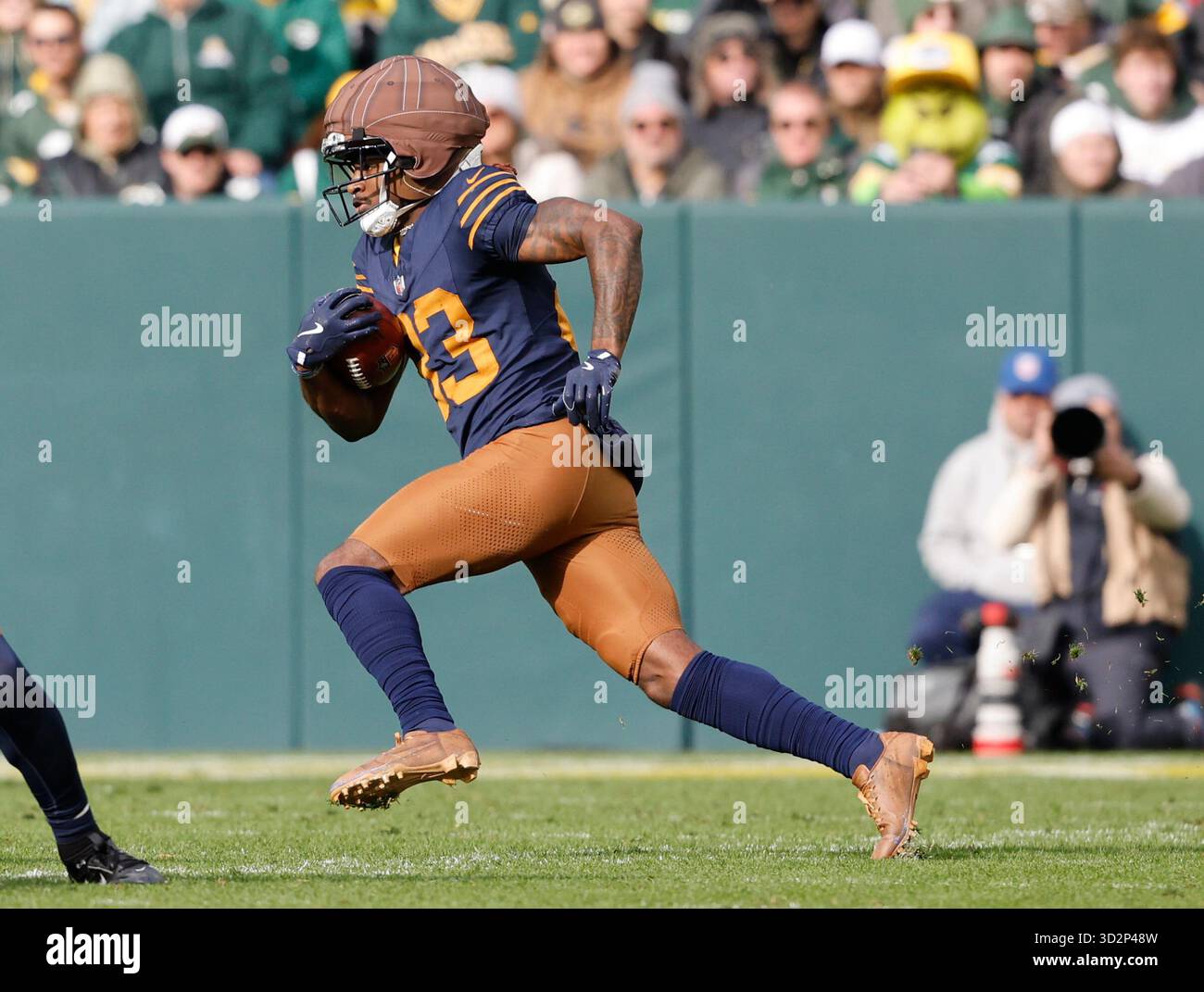 Green Bay Packers wide receiver Savion Williams (83) runs back a ...