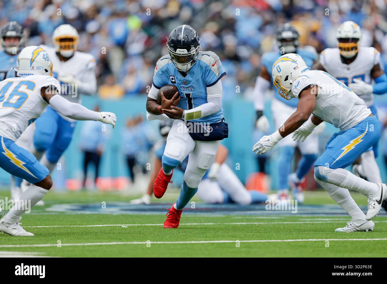 Tennessee Titans quarterback Cam Ward (1) is tackled by Los Angeles ...