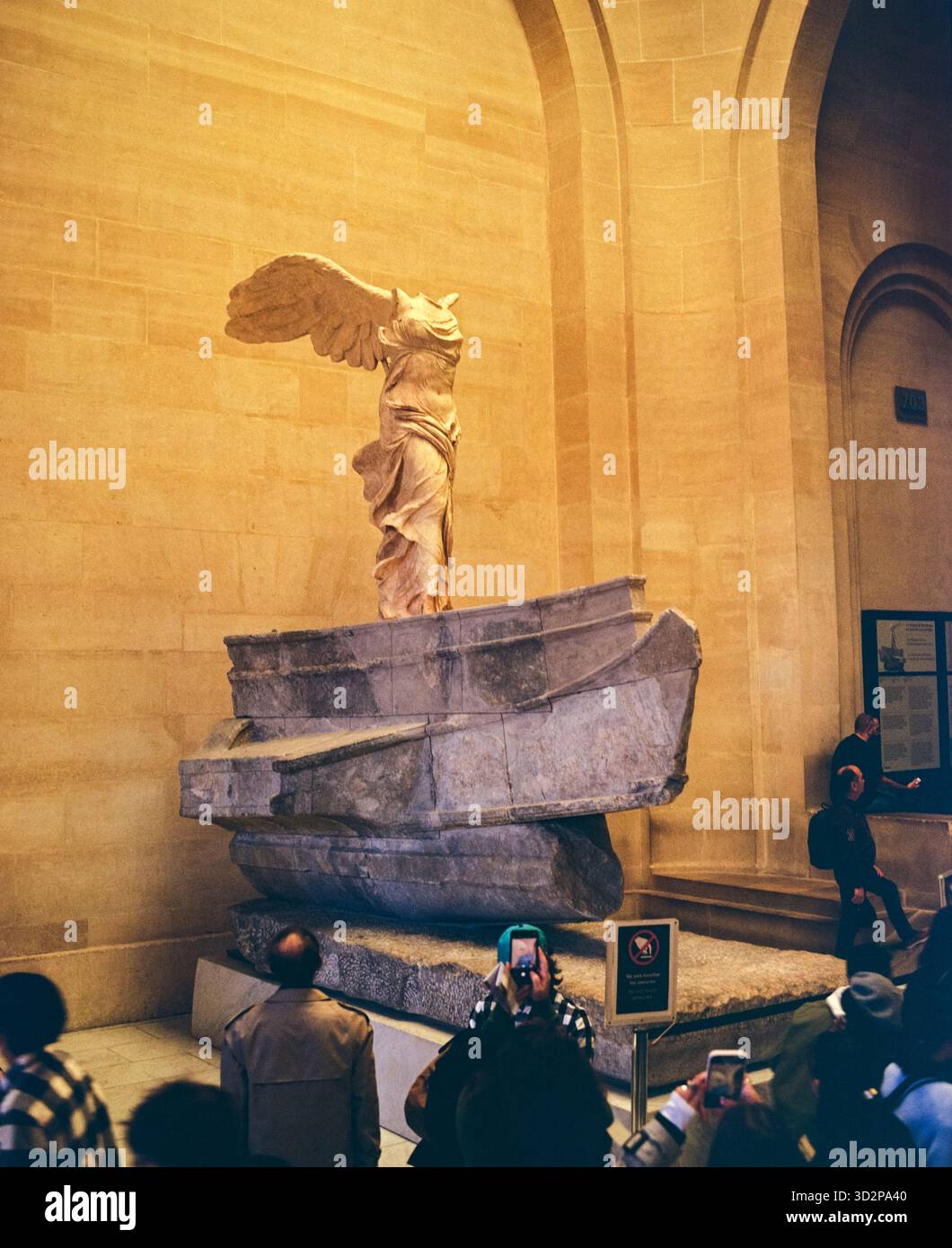 Crowd Visiting The Winged Victory Of Samothrace Sculpture In The Louvre crowd-visiting-the-winged-victory-of-samothrace-sculpture-in-the-louvre