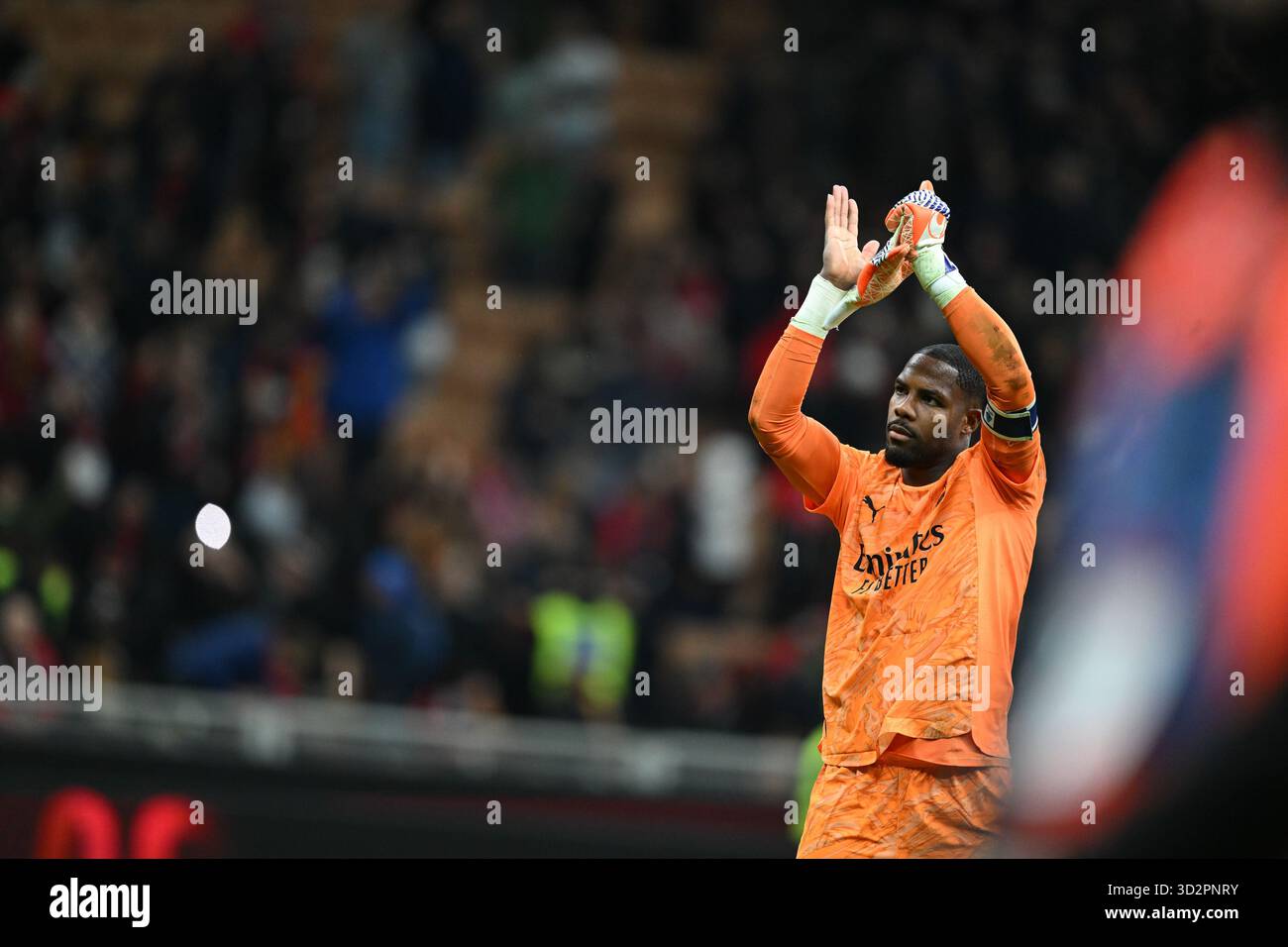 Mike Maignan of AC Milan celebrating after a victory during the Italian ...