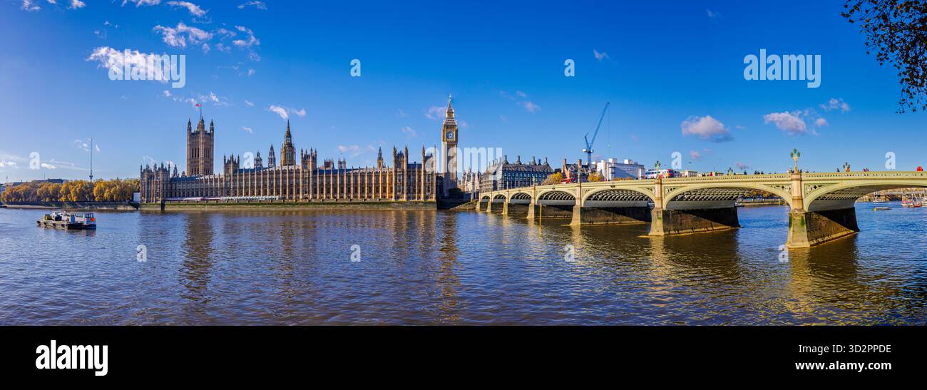 The Houses of Parliament and Westminster Bridge seen over the River Thames from the South Bank, London SW1, England on a sunny day with blue sky Stock Photo