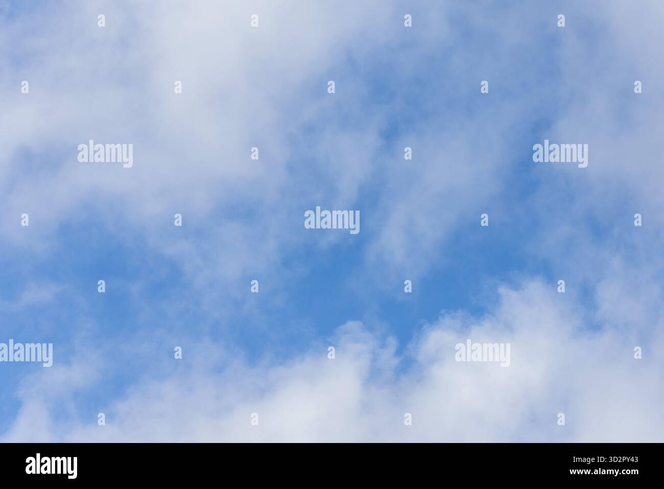 Clouds Opening to Blue Sky – Dramatic Sky Background Texture Stock Photo