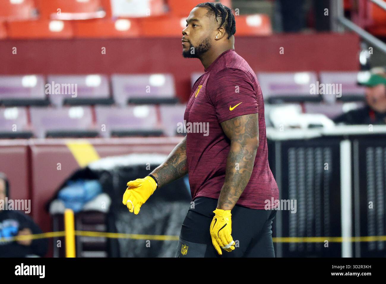Washington Commanders nose tackle Daron Payne (94)looks on before an ...