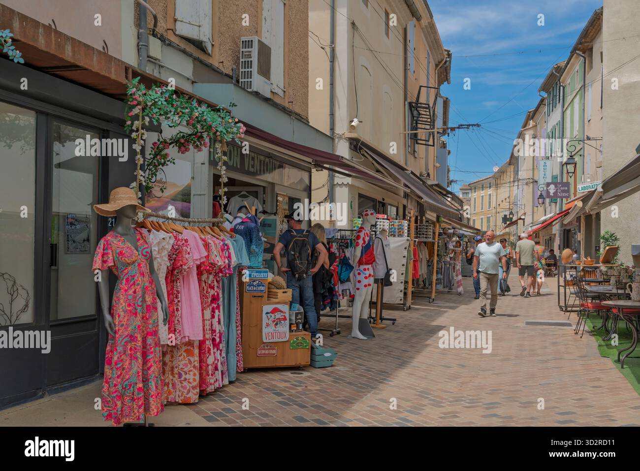 Shops along a street in the village of Vaison-la-Romaine, Drome, Provence, France, Europe. Stock Photo