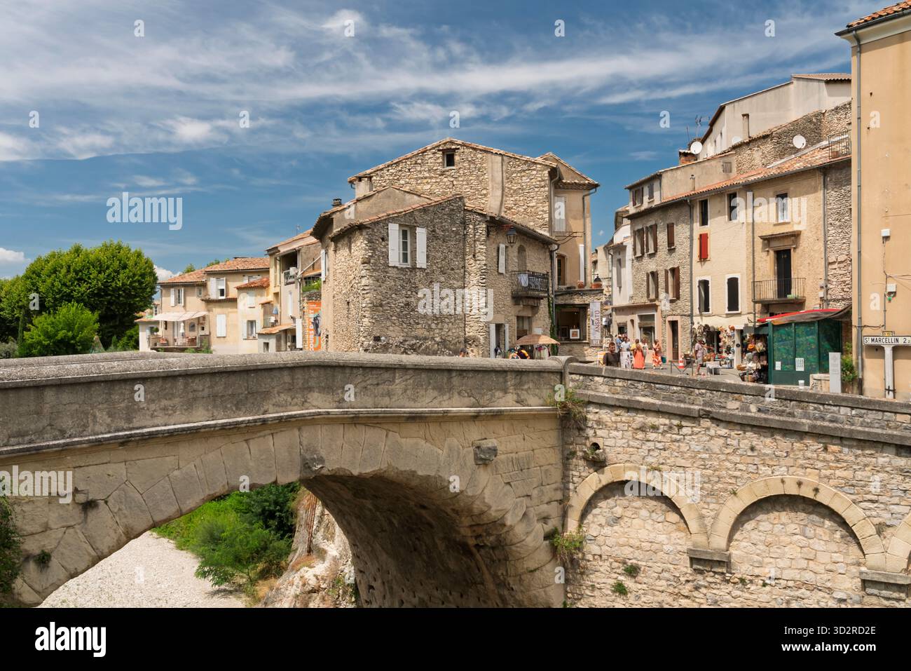 A bridge and street in the village of Vaison-la-Romaine, Drome, Provence, France, Europe. Stock Photo
