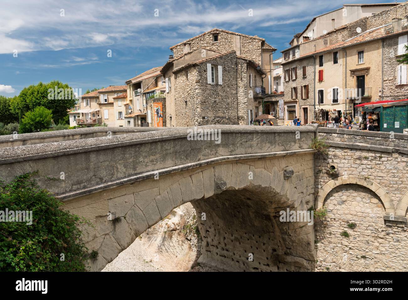 A bridge and street in the village of Vaison-la-Romaine, Drome, Provence, France, Europe. Stock Photo