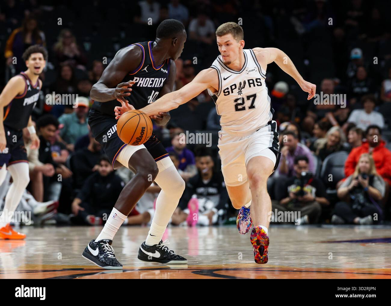 San Antonio Spurs forward Riley Minix (27) steals the ball from Phoenix ...