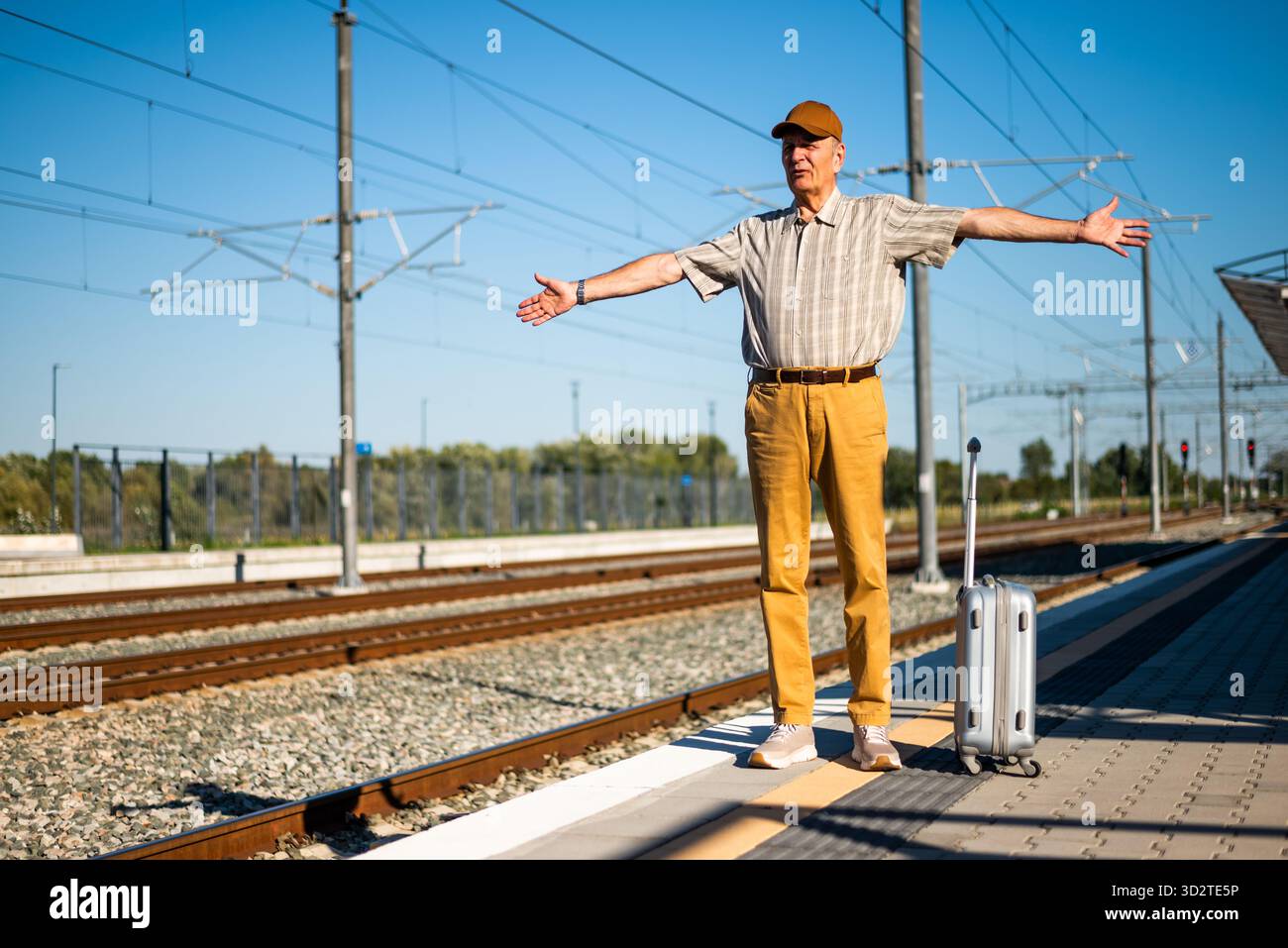 Angry man standing train hi-res stock photography and images - Alamy
