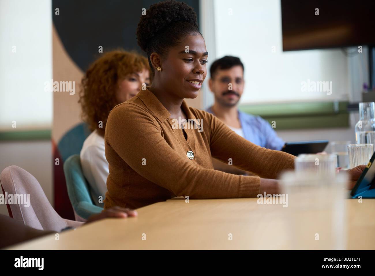 Diverse business team collaborating during office meeting Stock Photo