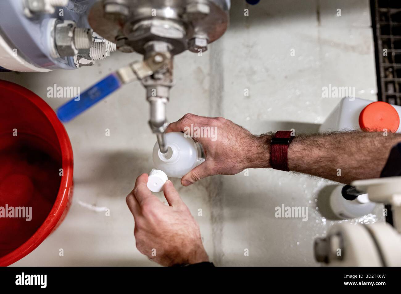 UTRECHT - An employee of drinking water company Vitens takes a water ...