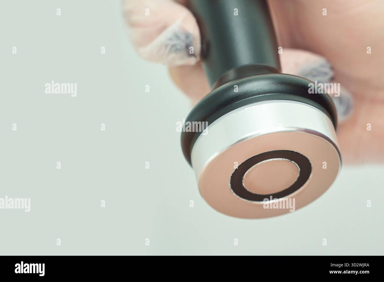 Hand holding cavitation therapy hi-res stock photography and images - Alamy