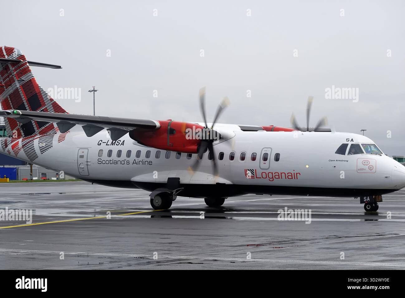 Scottish Airline, Loganair ATR 42-600, G-LMSA aircraft warm up on the tarmac at Glasgow Airport Stock Photo