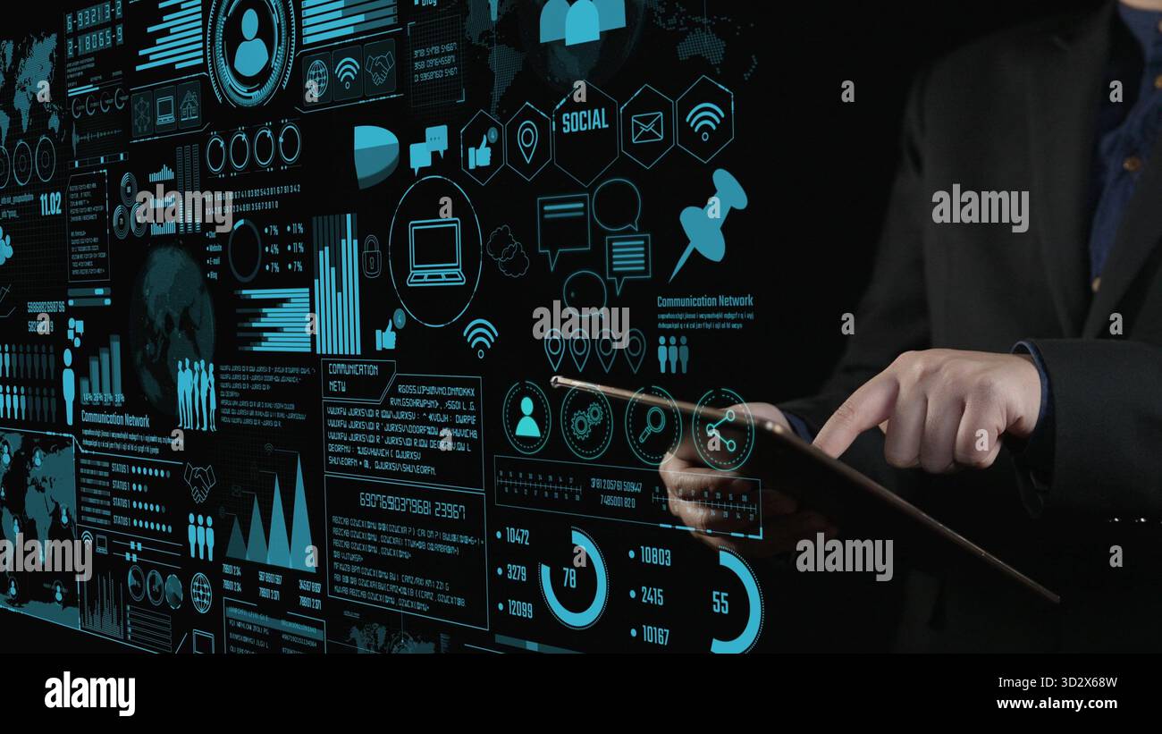 A business professional interacts with a touchscreen displaying digital ...