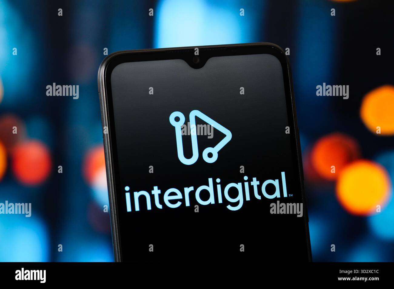 In this photo illustration, the InterDigital (Inter Digital) logo is ...