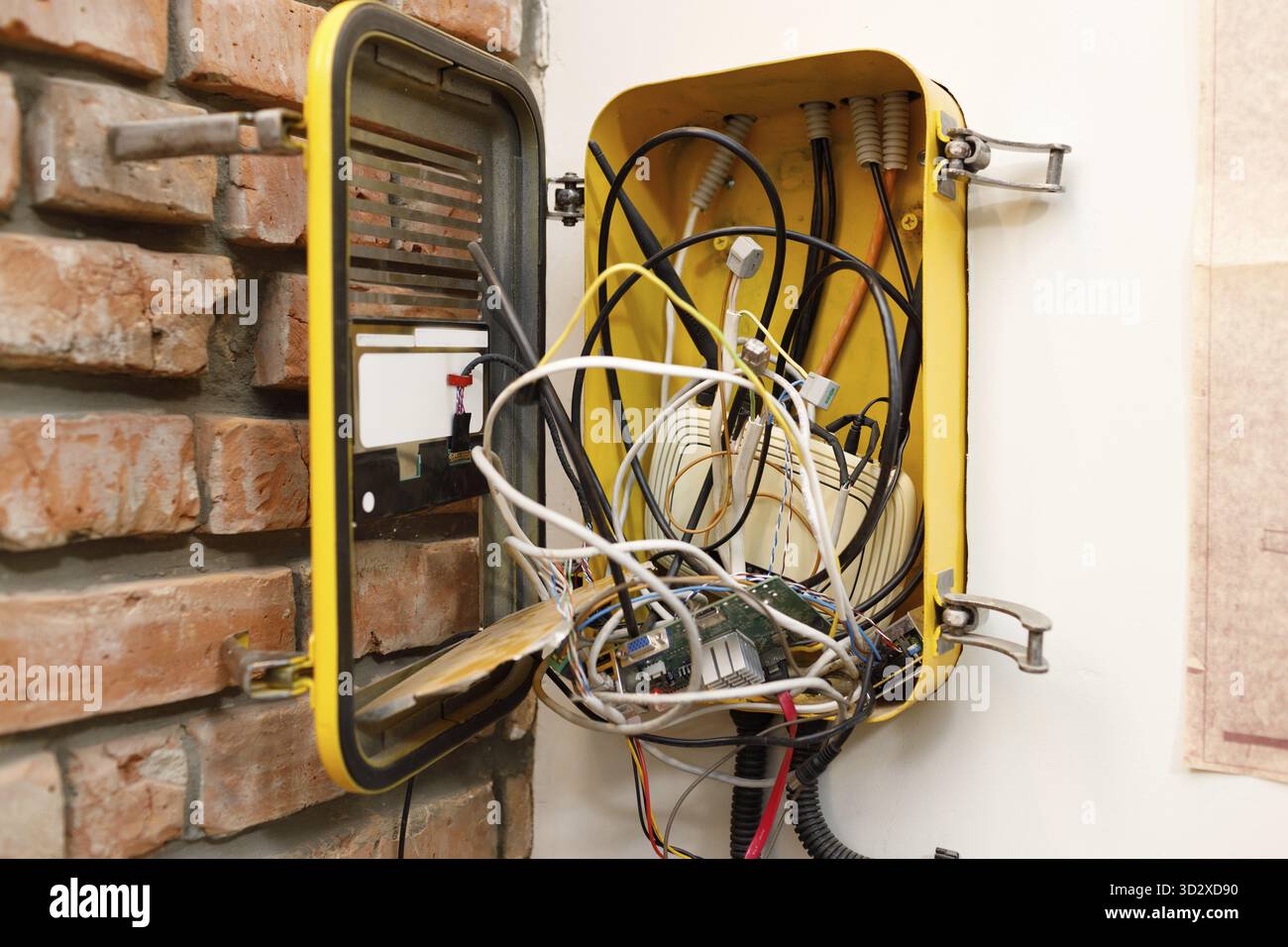 A switchboard with an electrical connecting cables and wi-fi router box Stock Photo