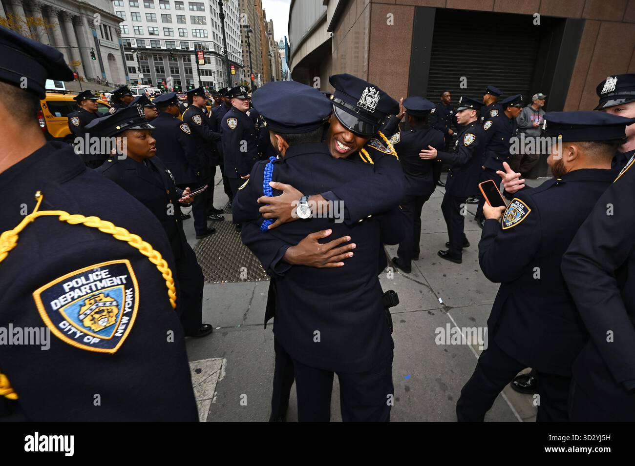 Newly sworn in NYPD Officers gather and celebrate outside of Madison ...