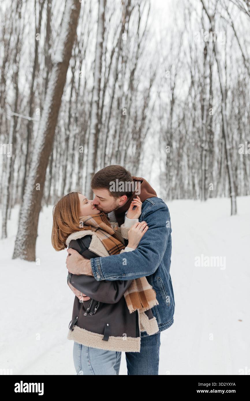 In this enchanting winter wonderland, a couple shares a heartwarming ...