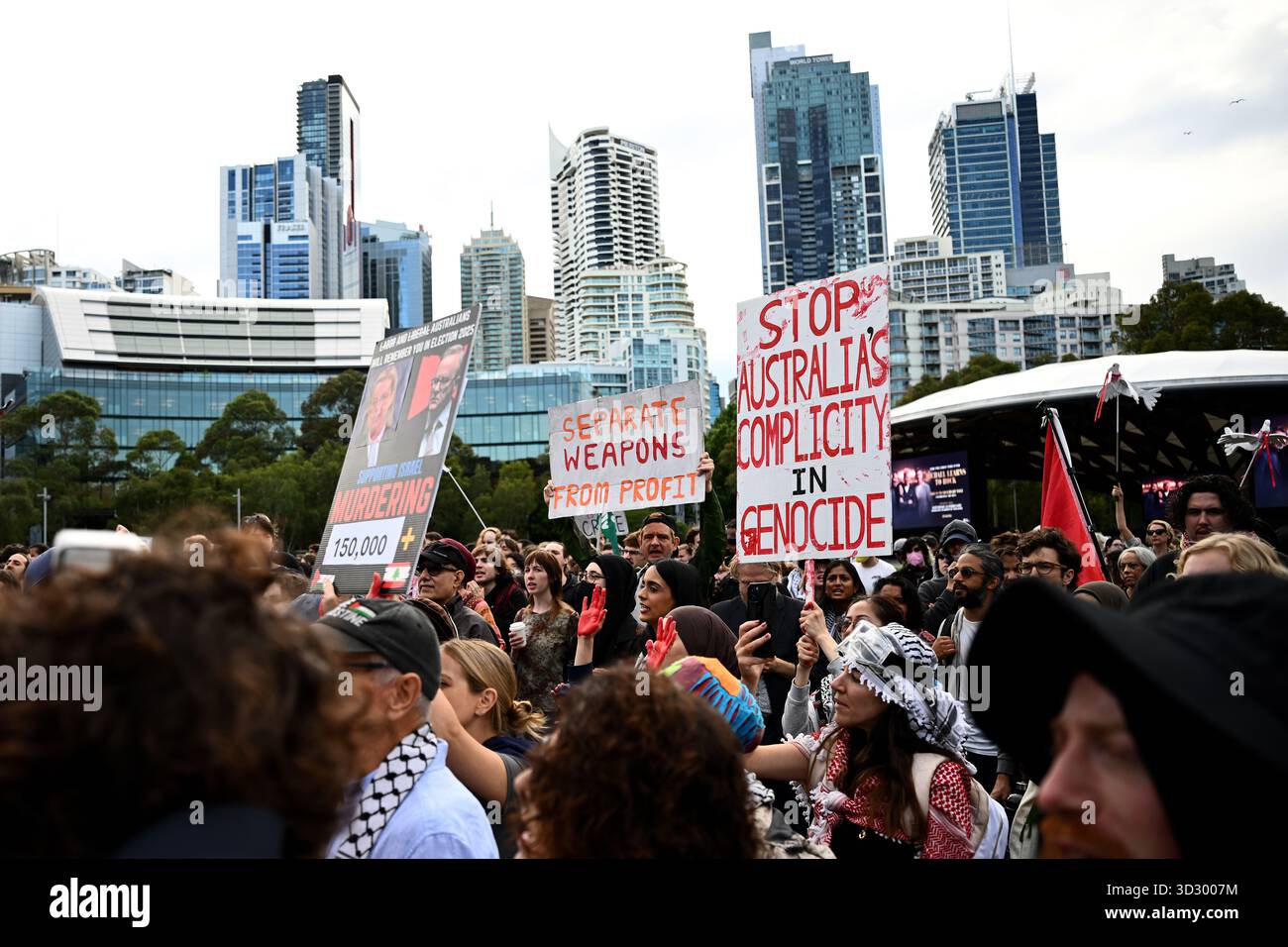 Protesters hold placards during and attempted blockade by the Palestine ...