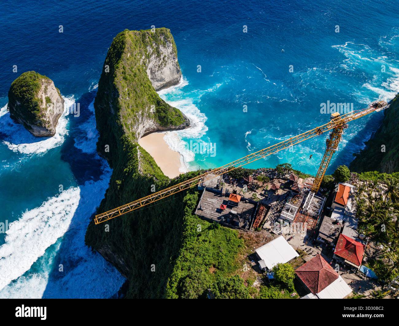 Aerial drone view of elevator construction at iconic Kelingking Beach