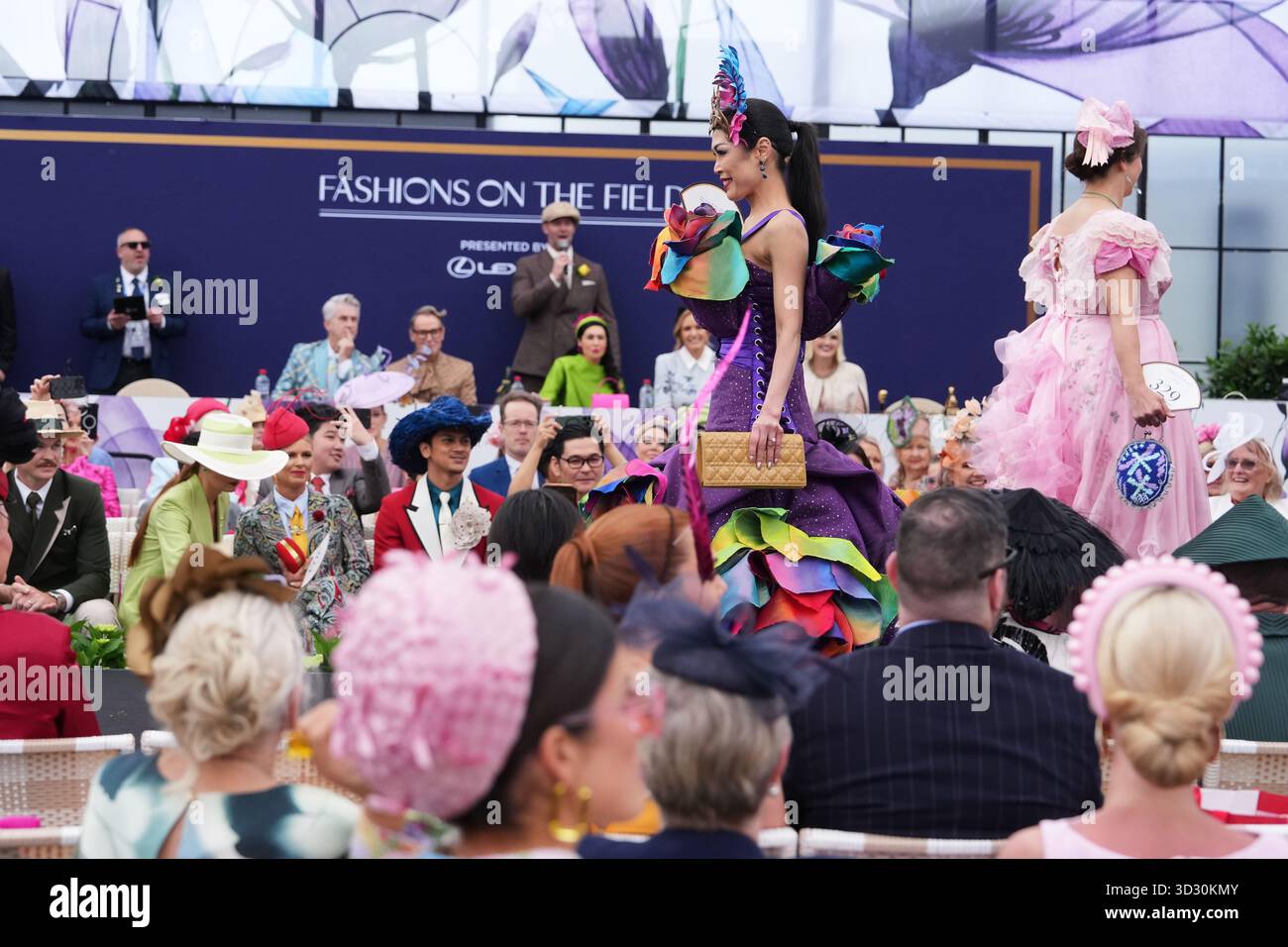 Contestants compete in the "Fashions in the Field" ahead of the — free download