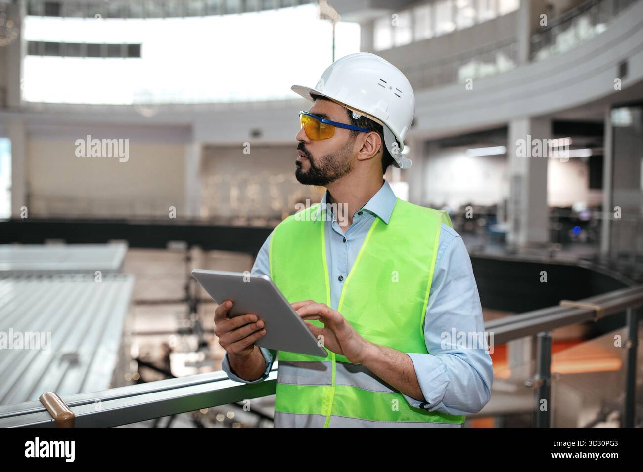 Engineer Inside Professional Engineer Monitors Project Progress Inside a Modern ...