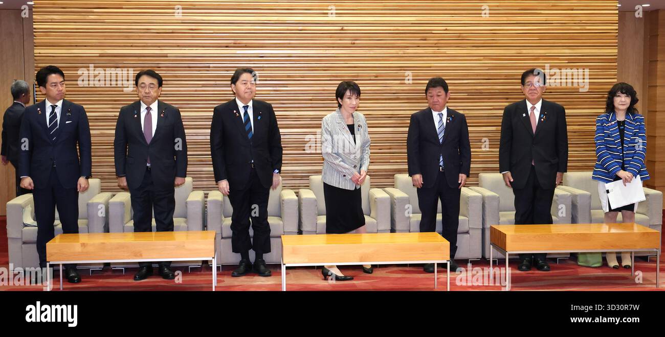 Japanese Prime Minister Sanae Takaichi (C) attends a cabinet meeting at ...