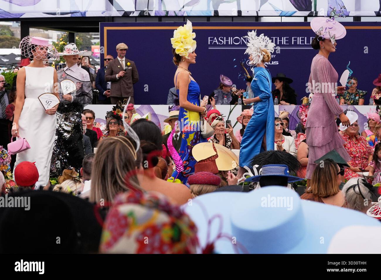 Contestants compete in the "Fashions in the Field" ahead of the — free download