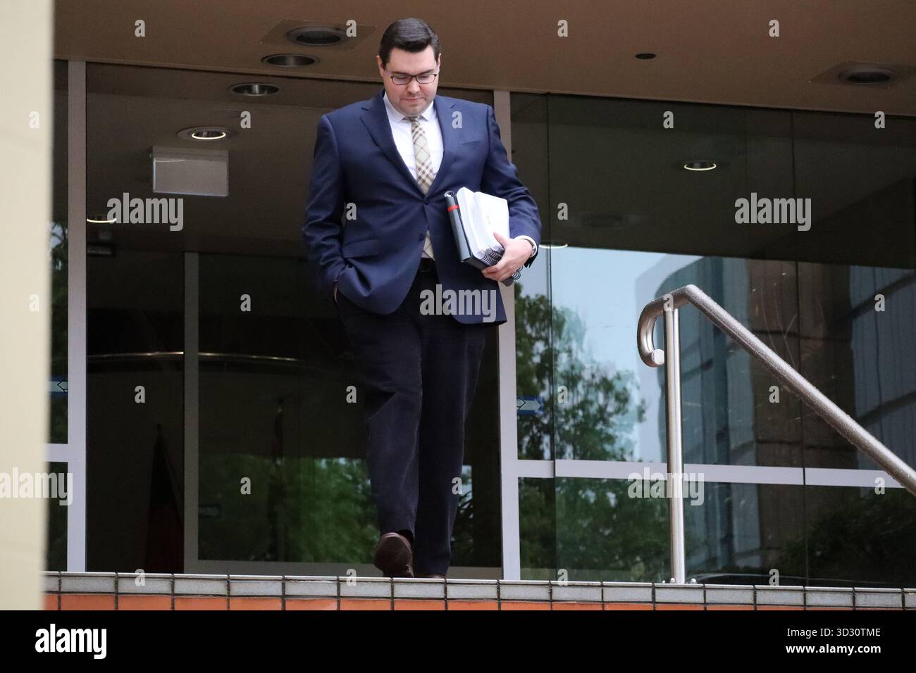 Bruce Lehrmann leaves the Federal Court of Australia in Hobart ...