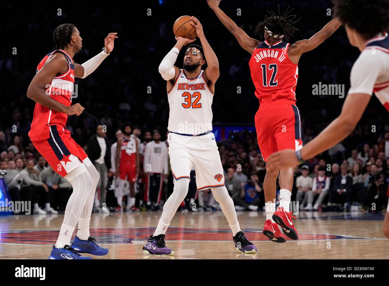 New York Knicks center Karl-Anthony Towns (32) shoots during the first ...