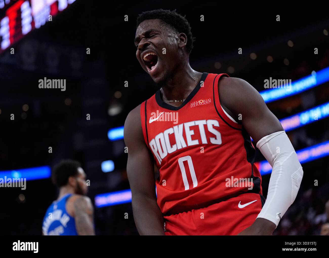 Houston Rockets guard Aaron Holiday celebrates after a shot during the ...