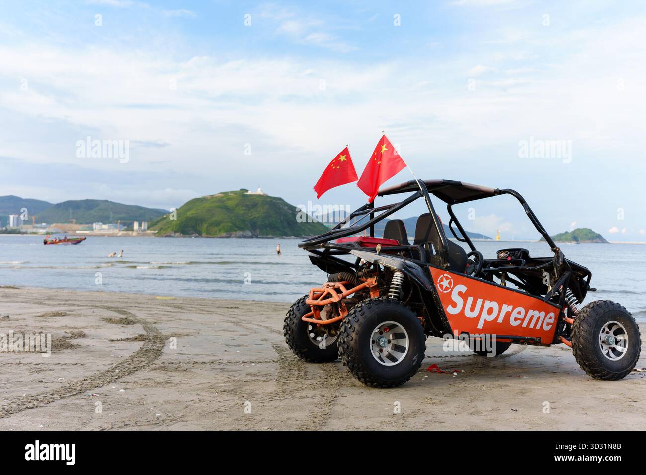 Motorcycle on beach blue sky hi-res stock photography and images - Alamy