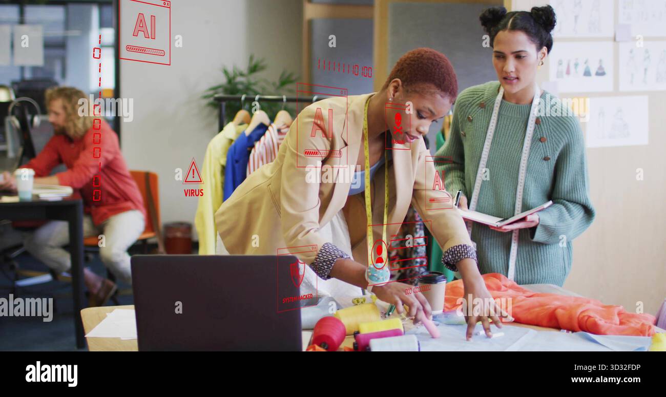 Collaborating two fashion designers examining fabric in fashion design studio with thread spools Stock Photo