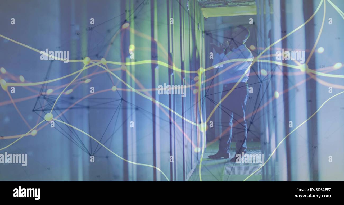 Inspecting admin adjusting server connections in data center corridor, with LED lights, copy space Stock Photo
