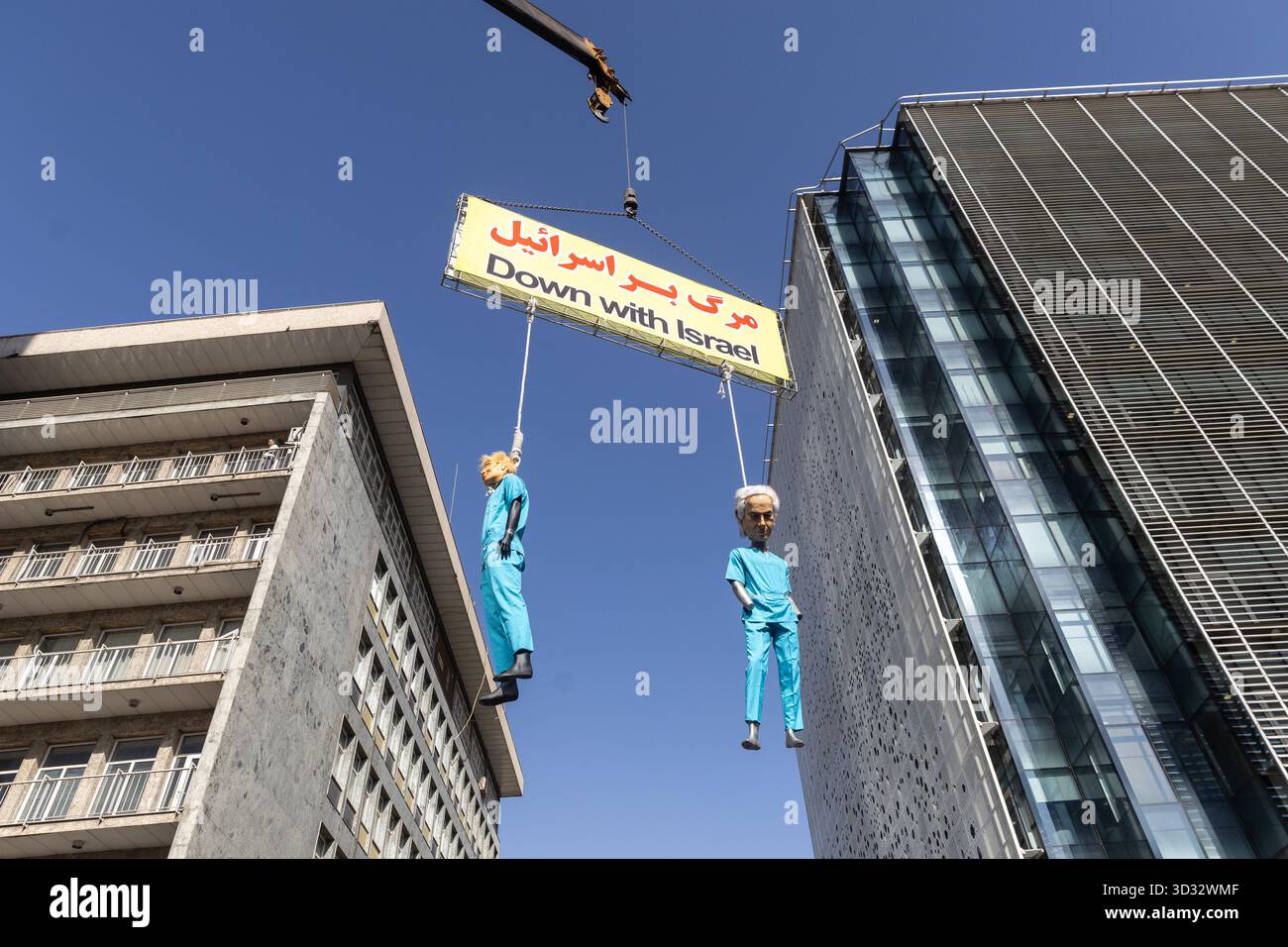 Tehran, Iran. 04th Nov, 2025. Effigies of U.S. President Donald Trump and Israeli Prime Minister Benjamin Netanyahu seen hanged during a rally marking the 46th anniversary of the U.S. Embassy takeover. Credit: SOPA Images Limited/Alamy Live News Stock Photo
