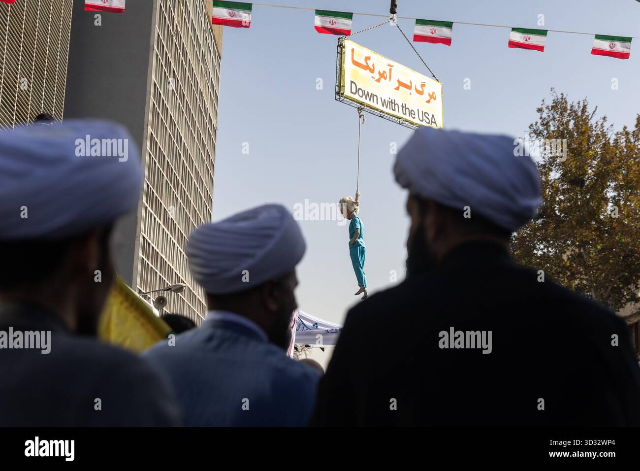 Tehran, Iran. 04th Nov, 2025. Effigies of U.S. President Donald Trump and Israeli Prime Minister Benjamin Netanyahu seen hanged during a rally marking the 46th anniversary of the U.S. Embassy takeover. Credit: SOPA Images Limited/Alamy Live News Stock Photo