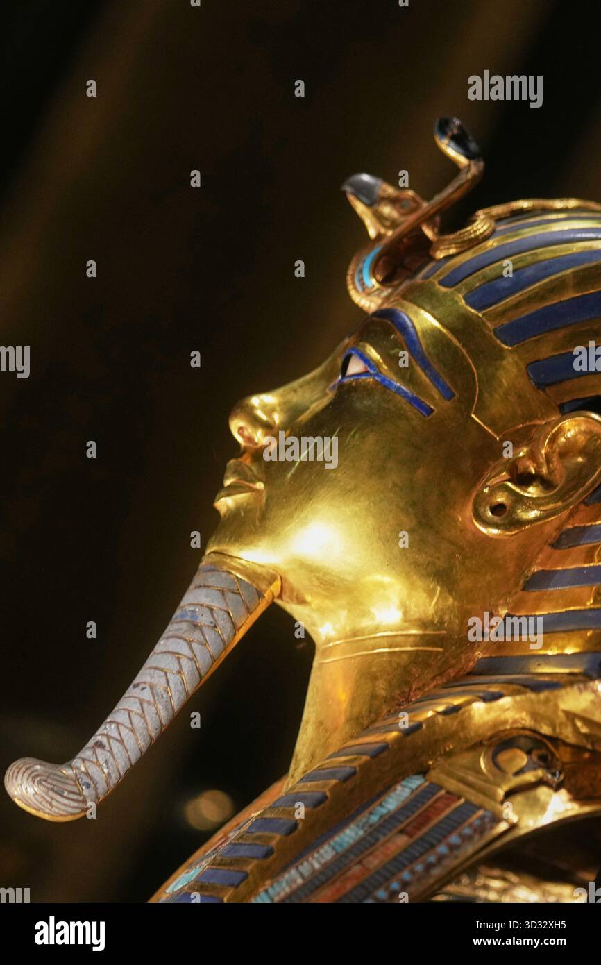 The golden burial mask of King Tutankhamun is seen on display during ...