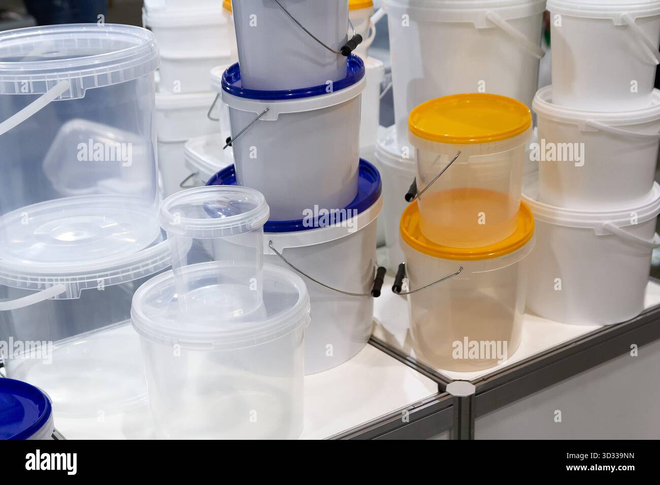 Plastic containers, packaging in a showcase. Industry Stock Photo - Alamy