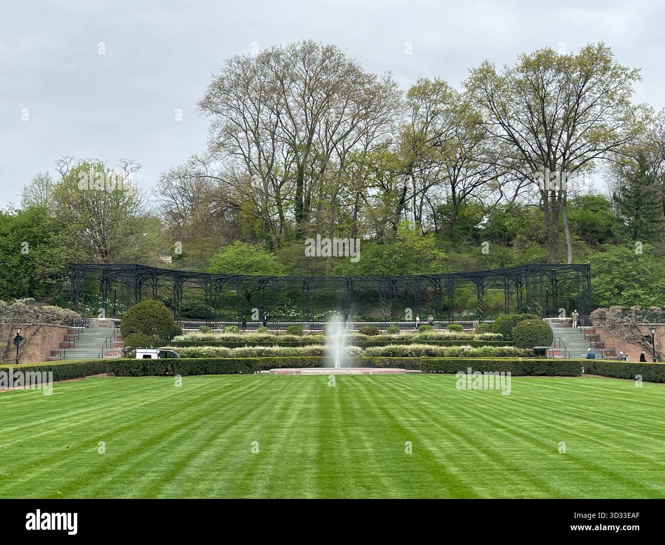 Central Park’s Conservatory Garden blooms in vibrant summer greens - Smartphone Captured Stock Image